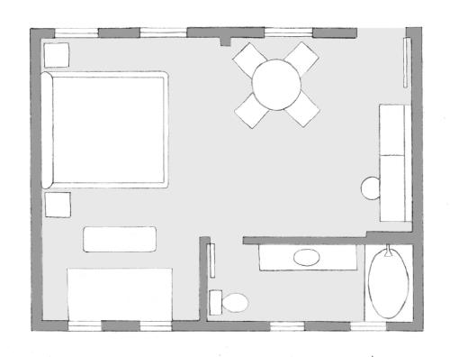 a floor plan of a living room at Austin Motel in Austin