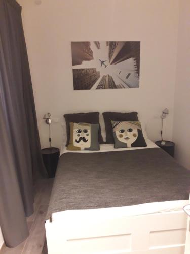 Letto o letti in una camera di EasyInRome Navona