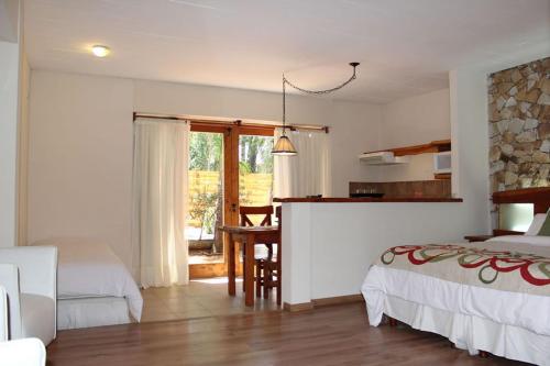 Postel nebo postele na pokoji v ubytování Mar Azul Suites Apart Boutique