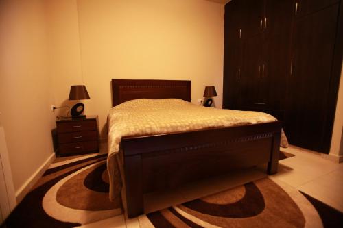 מיטה או מיטות בחדר ב-Cedars Palace