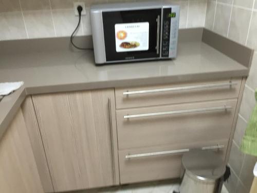 Η κουζίνα ή μικρή κουζίνα στο San Stefano Grand Plaza