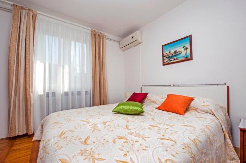 Postel nebo postele na pokoji v ubytování Rooms Stefania