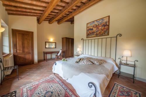 Säng eller sängar i ett rum på Villa Gemelli