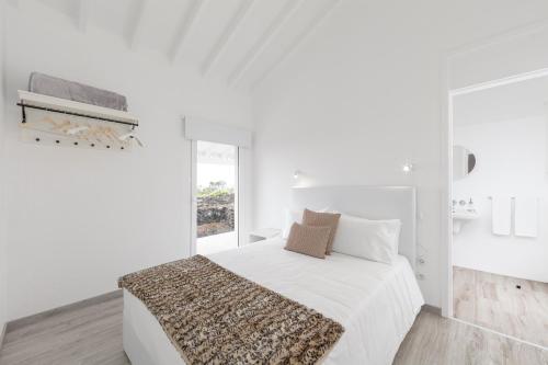 Postel nebo postele na pokoji v ubytování Insula Vinus Apartments