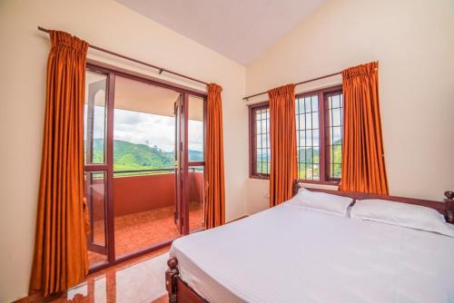 Postel nebo postele na pokoji v ubytování Mist Resorts Ooty