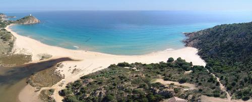 an aerial view of a beach and the ocean at Casa Bithia in Chia