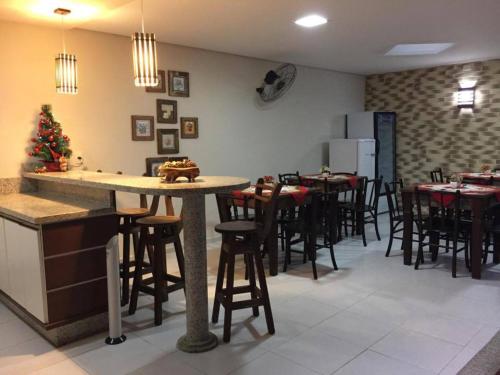 
Um restaurante ou outro lugar para comer em Pousada Vô Santino
