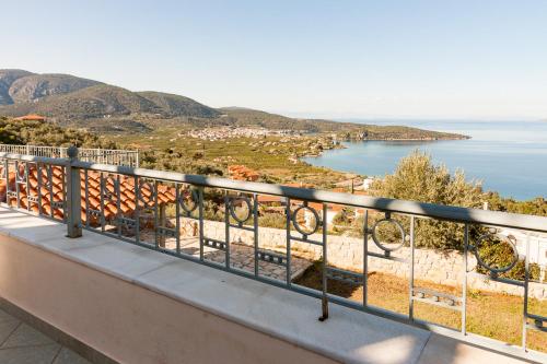 a balcony with a view of the ocean at Epidavros Seascape in Ancient Epidavros