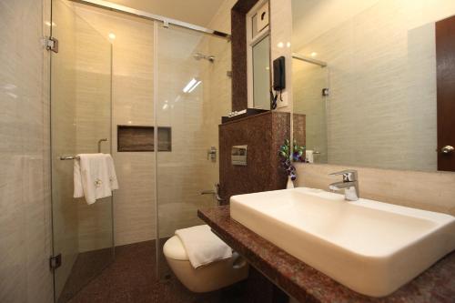 Kupatilo u objektu Temple Tree Hotel