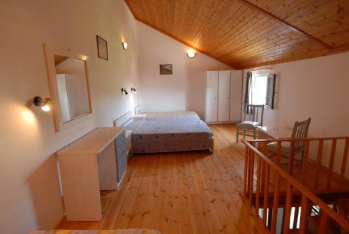 Ένα ή περισσότερα κρεβάτια σε δωμάτιο στο Starvillas Apartments and Studios