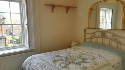 A bed or beds in a room at Teesdale Rooms 