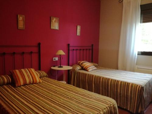 Ένα ή περισσότερα κρεβάτια σε δωμάτιο στο hotel rural la gavilla