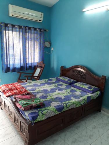 Un pat sau paturi într-o cameră la Mariano Gracinda resort