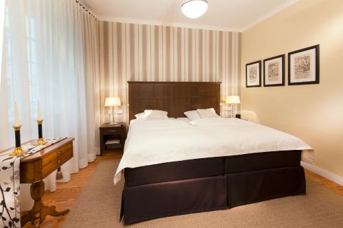 Ένα ή περισσότερα κρεβάτια σε δωμάτιο στο Boutique-Hotel Moseltor