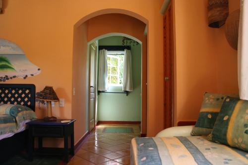 Una cama o camas en una habitación de Hotel - Residencial Madrugada