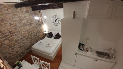 Posteľ alebo postele v izbe v ubytovaní Center of Split
