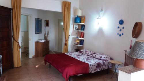 Posteľ alebo postele v izbe v ubytovaní Panoramico con giardino