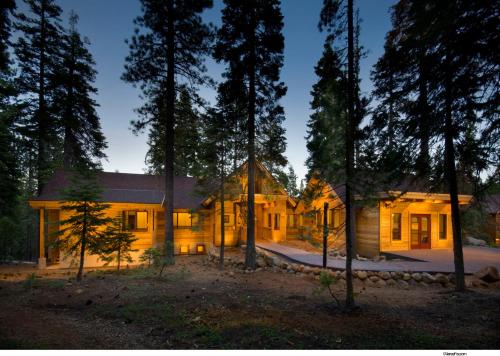 a house in the woods at night at Granlibakken Tahoe in Tahoe City