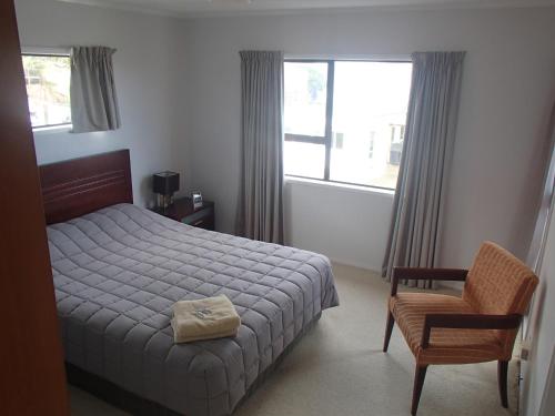 Postel nebo postele na pokoji v ubytování White Sands