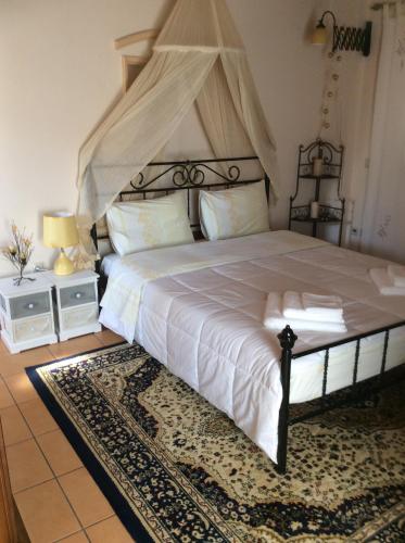 Ένα ή περισσότερα κρεβάτια σε δωμάτιο στο Toula's House