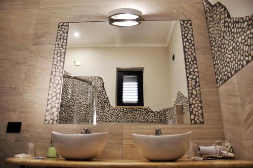 Phòng tắm tại L'Airone Country House