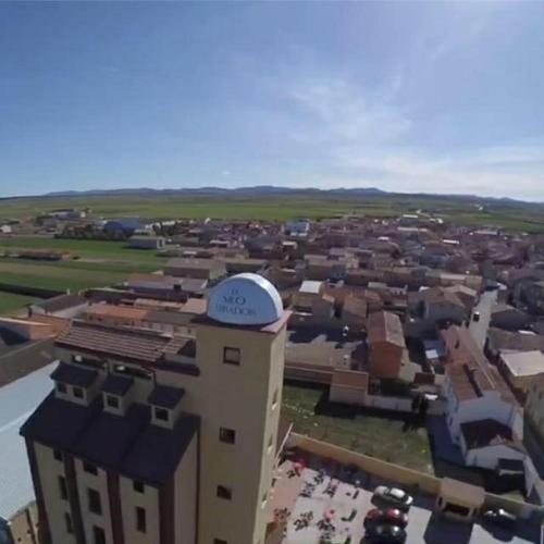 an aerial view of a city with a building at Mirador El Silo in Bello