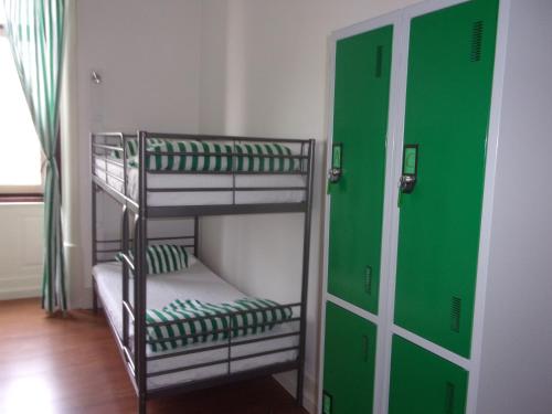 Ένα ή περισσότερα κρεβάτια σε δωμάτιο στο Hostel 402