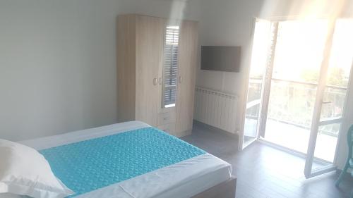 Postel nebo postele na pokoji v ubytování Apartments La Dolce Vita