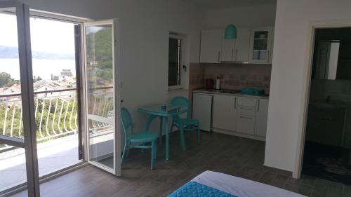 Kuchyň nebo kuchyňský kout v ubytování Apartments La Dolce Vita