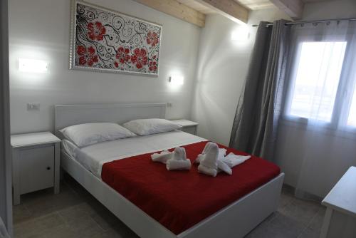 Posteľ alebo postele v izbe v ubytovaní B&B LADY JOLANDA