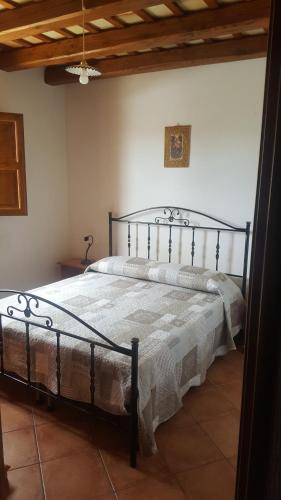 Tempat tidur dalam kamar di Vecchio Baglio Cofano