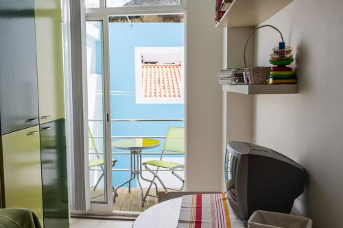 Χώρος καθιστικού στο Casa de Hóspedes Porto Pim