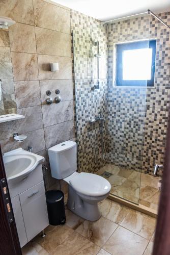 Un baño de Apartments Timoni