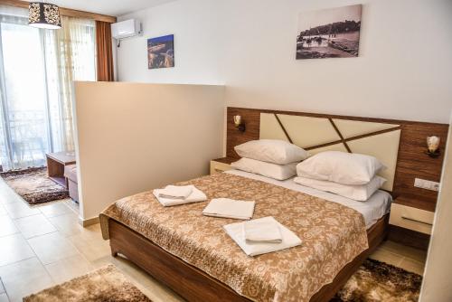 Cama o camas de una habitación en Apartments Timoni