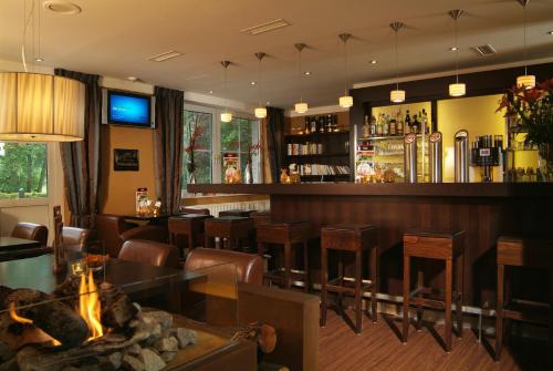 Zona de lounge sau bar la NordWest-Hotel Bad Zwischenahn