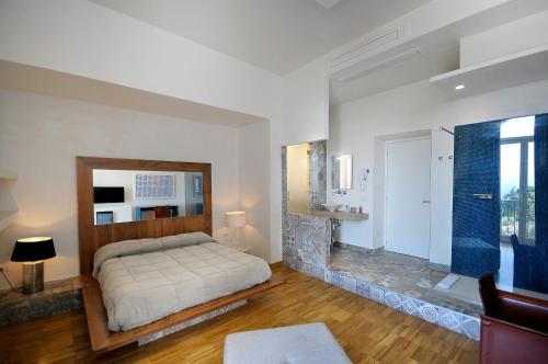 מיטה או מיטות בחדר ב-Villa Battista
