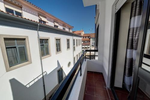 Ein Balkon oder eine Terrasse in der Unterkunft Bragança Apartments