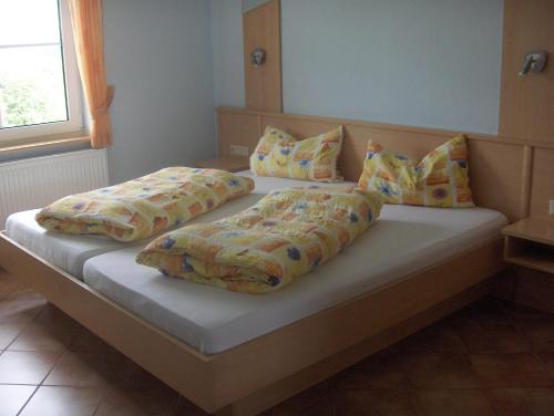 Katil atau katil-katil dalam bilik di Schweizes Ferienhof