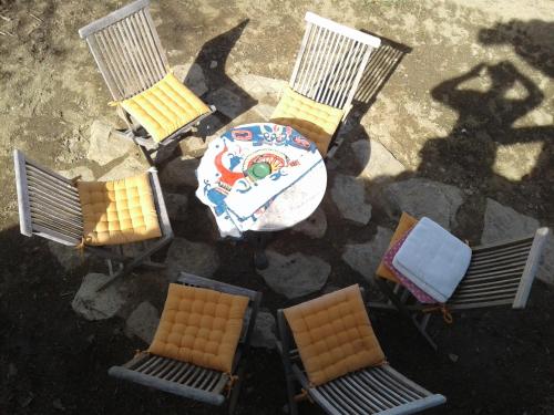 an overhead view of a table and chairs and a table and chairsktop at Razborca in Mislinja