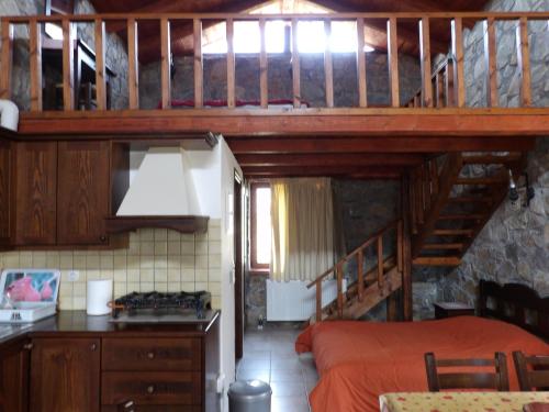 Ένα ή περισσότερα κρεβάτια σε δωμάτιο στο Arodamos Traditional Villas 