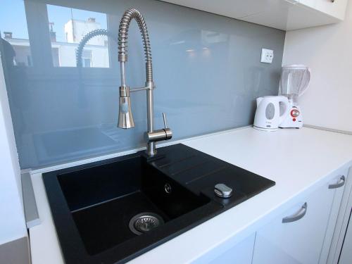 Kuchyň nebo kuchyňský kout v ubytování The View