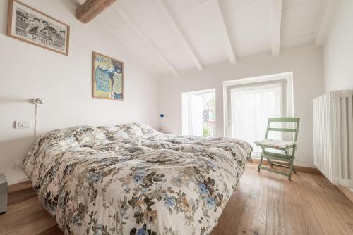 A bed or beds in a room at La Casina