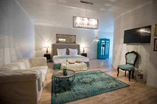Postel nebo postele na pokoji v ubytování Hotel Tempo Boutique