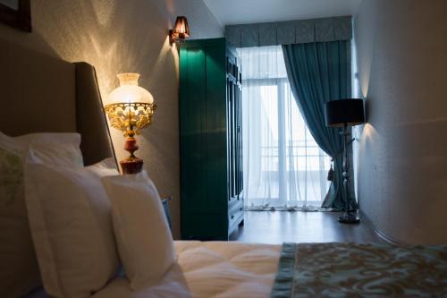 Postel nebo postele na pokoji v ubytování Hotel Tempo Boutique