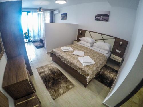 Cama o camas de una habitación en Apartments Timoni