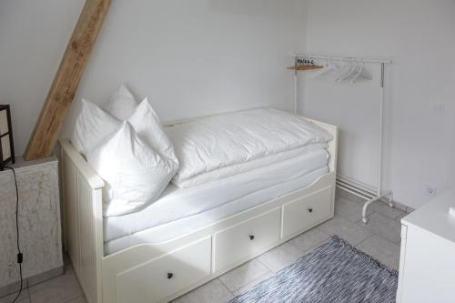 Ein Bett oder Betten in einem Zimmer der Unterkunft Reiterhof an der Nordsee