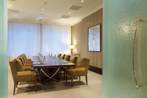 a conference room with a long table and chairs at The Chester Grosvenor in Chester
