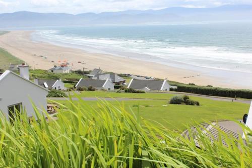 a view of a beach with houses and the ocean at Inch Beach House B&B in Inch