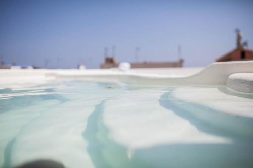 a close up of a swimming pool at La Settima Luna Hotel in Canneto