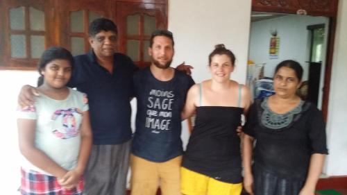 a group of people posing for a picture at Peacock Residence & Cabana's in Tangalle